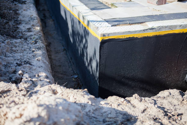 Professional Interior Drainage System technician working in Miamitown, OH
